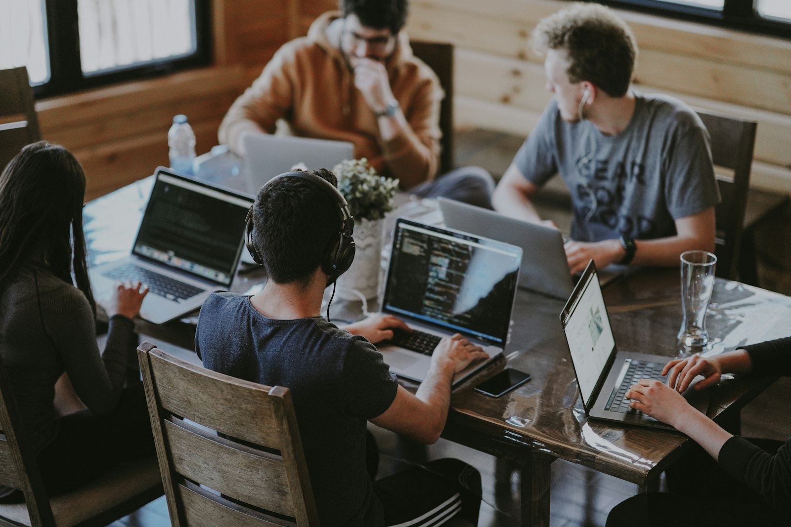 Embedded growth pod collaborating in an open-plan office